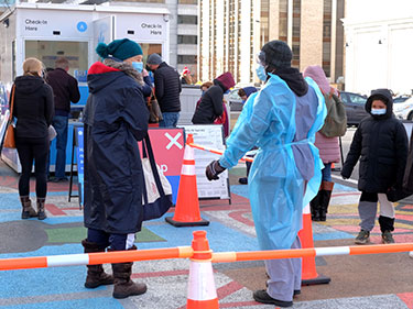 People line up in Arlington, Virginia, for COVID-19 tests