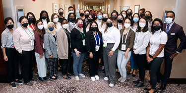 Group shot of people wearing masks
