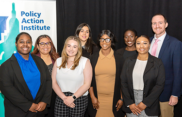 Attendees of the Policy Action Institute pose for the camera