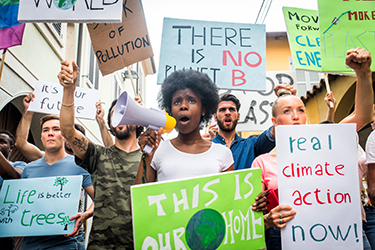 Advocates march for climate action in the streets.