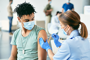 Man gets vaccinated