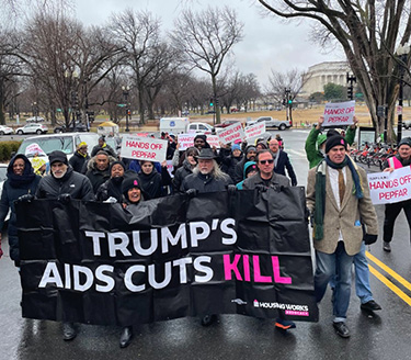 Advocates march in Washington, D.C., to protest cuts to PEPFAR, or President's Emergency Plan for AIDS Relief